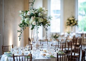 Beautifully decorated wedding reception table with floral centerpiece and fine dining setup in Lancaster, PA.
